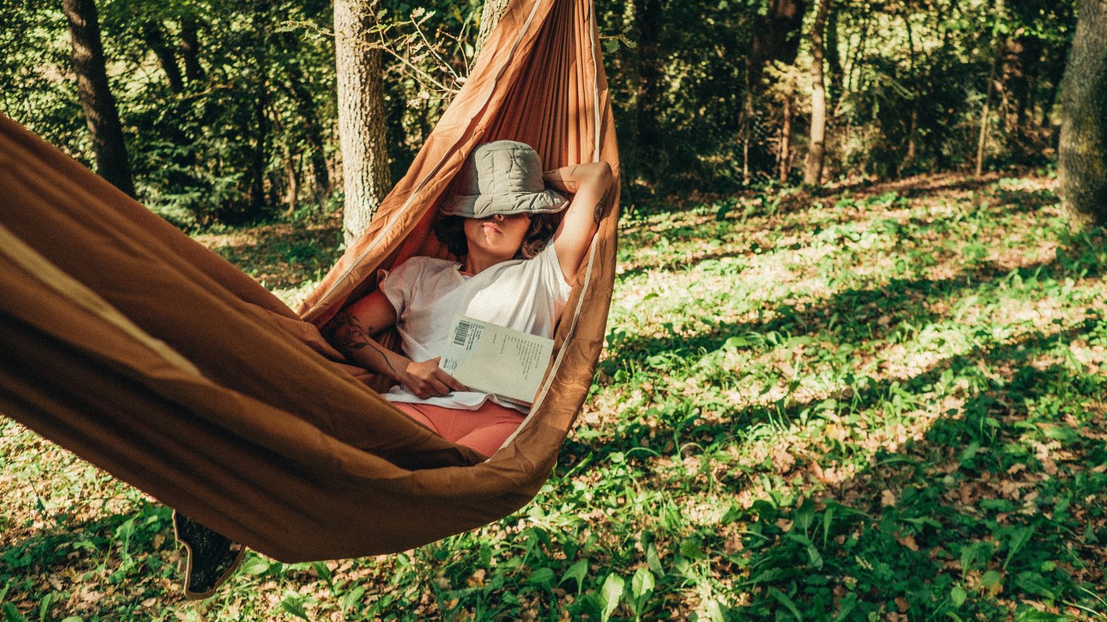 Woman sleeping in a hammock