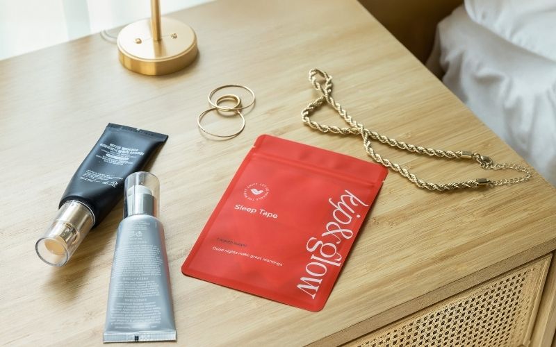 Bedside table showing kip&glow Sleep Tape