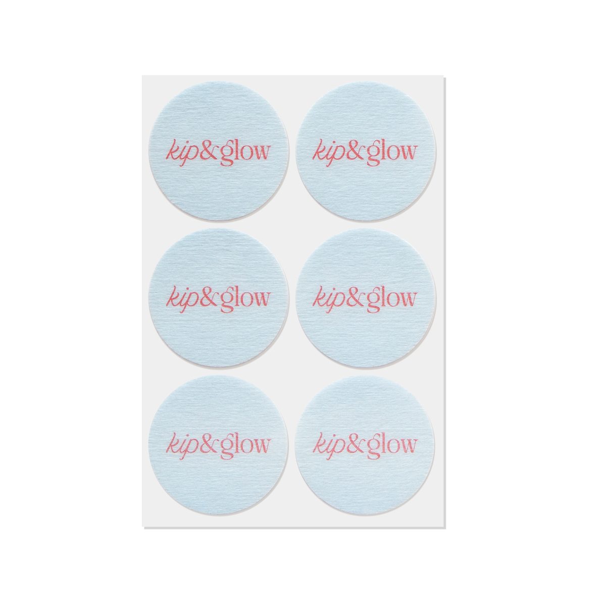 Set of six round patches with 'kip&glow' text on a white background