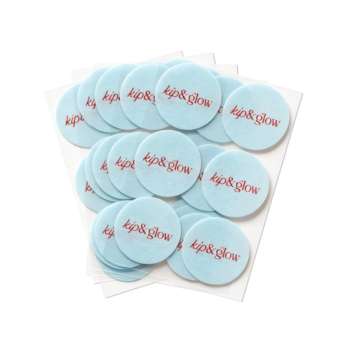 Light blue patches with 'kip & glow' text on a white background