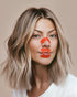 Woman wearing kip&glow Nose Strips across the bridge of the nose and Sleep Tape on her mouth
