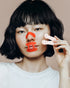 Model wearing kip&glow Nose Strips and Sleep Tape